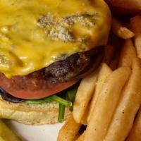 Beef Burger · Served w/ lettuce, tomato, pickles, and french fries or salad