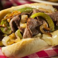 Philly Cheese Steak With Bacon Deluxe · Juicy thinly sliced beef steak, crispy bacon, onions, green peppers, and creamy cheese serve...