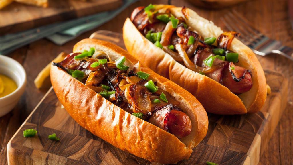 All Beef Hot Dog With Bacon · Juicy hot dog and crispy bacon served in toasted buns.