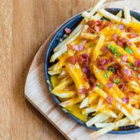 Cheese Fries With Bacon Bits · Crispy golden fresh French fries smothered in creamy cheese then topped with crispy bacon bi...