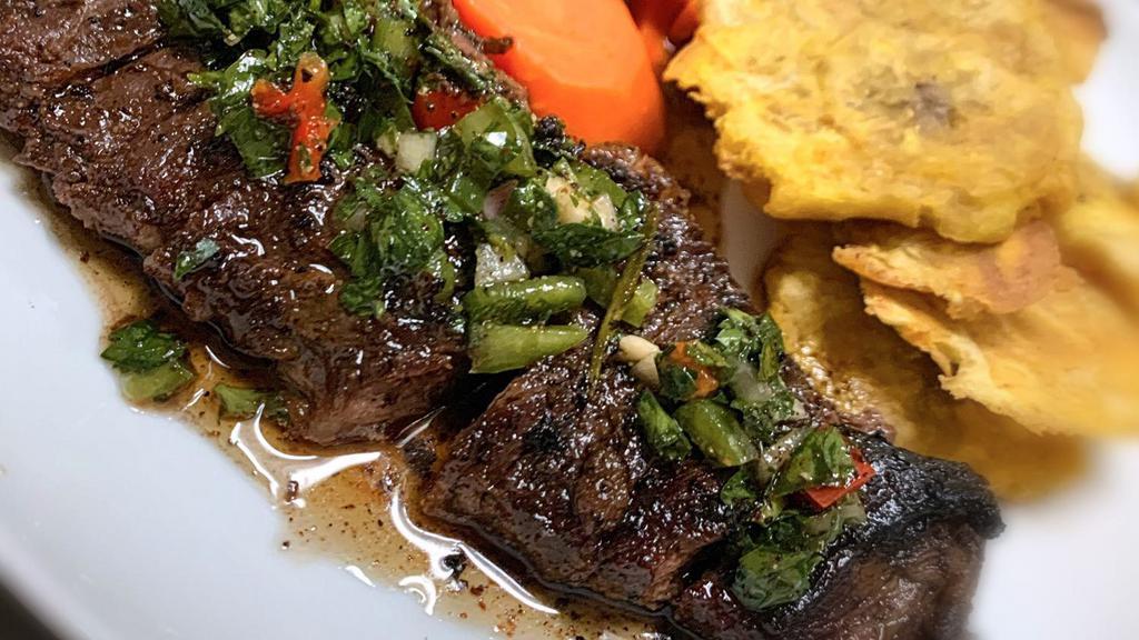 Grilled Skirt Steak · 10 oz. grilled succulent and flavorful cut served with tropical rice.