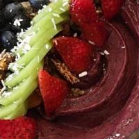 Acai Bowl · Banana blueberries free-trade acai coconut milk topped with kiwi blueberries strawberry and ...