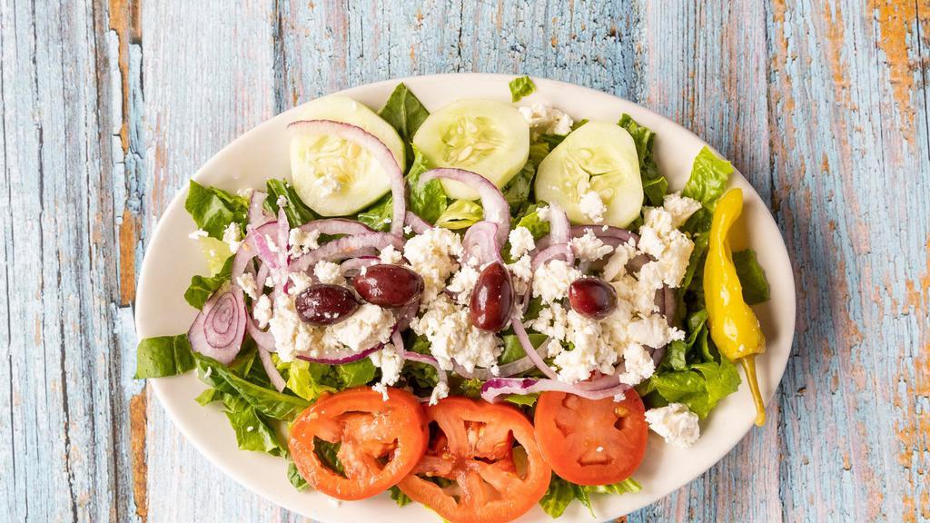 Greek Salad (Small) · Romaine lettuce, tomatoes, cucumbers, red onion, feta cheese calamatta olives, and pepperoncini