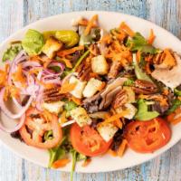 Mixed Green Salad (Large) · Mixed greens, sliced tomatoes, red onions, carrots, mushrooms, croutons, pepperoncini & Pecans