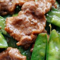 Beef With Snow Peas · With white rice.