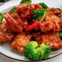 General Tso'S Chicken  · With white rice . Spicy. Chunks of crispy hand-breaded chicken sautéed with hot peppers, gar...