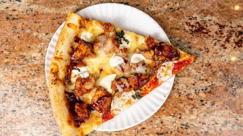 Bbq Chicken Pizza Slice · Topped with BBQ sauce, mozzarella, and chicken meat.