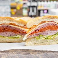 Italian Combo Sandwich · Salami, ham, pepperoni, provolone, lettuce and tomato.