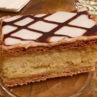 Napoleon · Sponge cake filled with layers of vanilla or chocolate custard and topped with vanilla or ch...