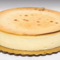 New York Cheesecake · Creamy and fine cheesecake. Six inch cake serves six to eight guests.