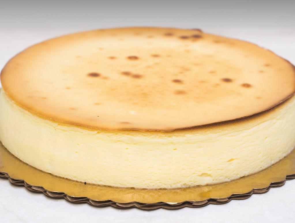 New York Cheesecake · Creamy and fine cheesecake. Six inch cake serves six to eight guests.