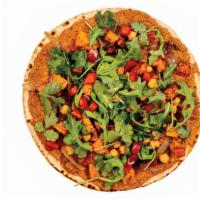Masala · spiced chickpea & tomato blend, spread on thin lavash bread topped with roasted onions & tom...