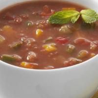 Gazpacho · Fresh cold soup with diced tomatoes, English cucumbers, Vidalia onions and bell peppers with...