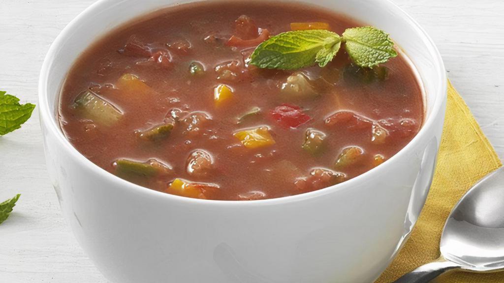 Gazpacho · Fresh cold soup with diced tomatoes, English cucumbers, Vidalia onions and bell peppers with extra virgin olive oil, balsamic vinegar and a dash of red pepper sauce.