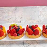 Fruit Tart · Fresh Fruits With Our Homemade Pastry Cream Filling. The Perfect Balance Of Flavors And Text...