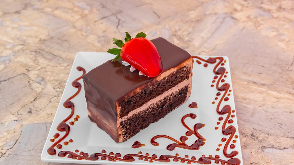 Chocolate Mousse Slice · A delicious Chocolate cake with Chocolate mousse..  The perfect chocoholics treat!