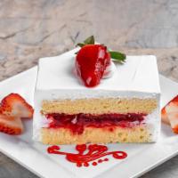 Strawberry Shortcake Slice · Delicate white cake filled and iced with fresh whipped cream and layered with  strawberry Pr...