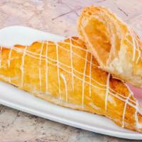 Apple Turnover  · A pastry with apple filling  topped with a sugar white drizzle