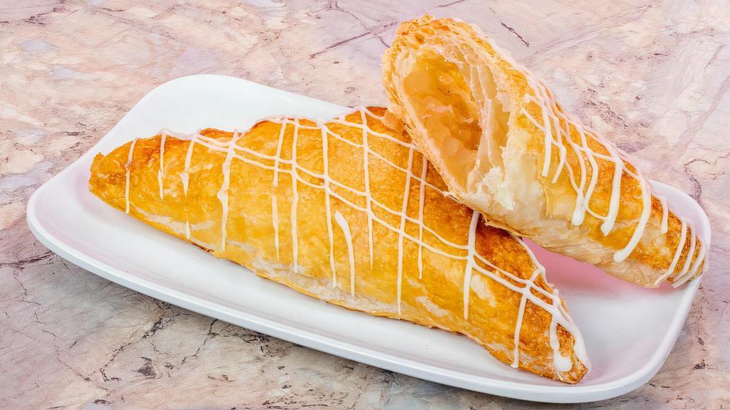 Apple Turnover  · A pastry with apple filling  topped with a sugar white drizzle