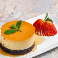 Chocoflan · A Rich Chocolate Cake Stacked With A Creamy Vanilla Flan Dripping With A Delicate Layer Of O...