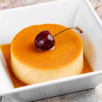 Personal Flan  · Classic flan is always a favorite, Made of creamy custard, and baked to perfection in a wate...