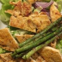 Laredo Chicken Salad · Grilled chicken breast on mixed greens, red onions, carrots and cucumbers w/ mango pico and ...
