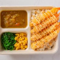 Shrimp Tempura Bento Box · Comes with Japanese Curry, Seaweed salad, corn, rice. Contains sesame seeds.