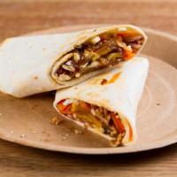 Steak Burrito · Juicy, grilled sliced steak with grilled onions and peppers, kidney beans, spicy jalapeños, ...