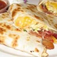 Quesadillas Norteñas · Chicken, steak, or pork loin. Served with rice and beans.