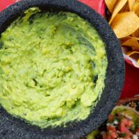 Guacamole · Served with tostaditas and salsa.
