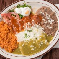 Tri-Enchiladas · Three colors one chicken, one ground beef (picadillo) and one cheese with red sauce, green s...