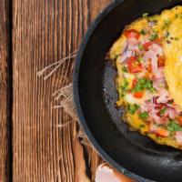 Farmer'S Omelette · Delicious breakfast Omelette made with three eggs, ham, bacon, and sausage. Served with a si...