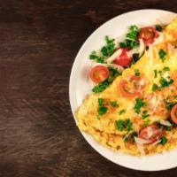 Italian Omelette · Delicious breakfast Omelette made with three eggs, sausage, peppers, mushrooms, onions, mozz...