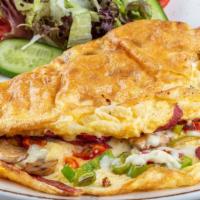 Pastrami Omelette · Delicious breakfast Omelette made with three eggs and Pastrami. Served with a side of Toast ...