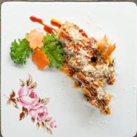 Red Dragon Roll Dinner Bento Box · Served with green salad, pork fried rice, California roll, 3 piece shrimp tempura and 3 piec...