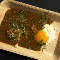 Lasun Fry: · Sunny side up eggs topped with garlic flavored gravy
