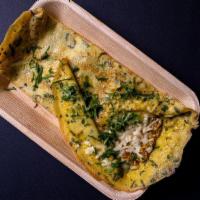 Lapeti: · Semi cooked omelet stuffed with shredded masala boiled eggs and cheese closed in shape of a ...