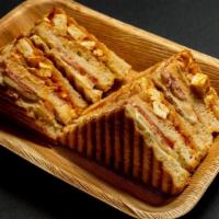 Paneer Masala: · 2 layered grilled cheese sandwich with marinated tandoori masala paneer, onions, tomato and ...
