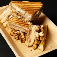 Paneer Toofani: · 2 layered grilled cheese sandwich with tabasco flavored tossed panner, crushed red pepper an...