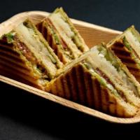 Veg Cheese: · 2 layered grilled cheese chutney sandwich with onions, tomato, potato, cucumber and green pe...