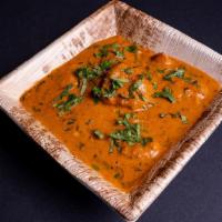 Tawa Butter Chicken: · Bold version of traditional butter chicken cooked on Tawa.