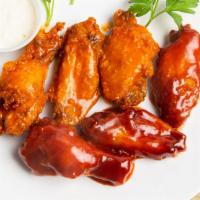 Buffalo Wings · With blue cheese and celery; mild or hot.