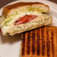 The Tuscany Panini · Grilled chicken, fresh mozzarella, cheese, roasted red peppers and pesto.