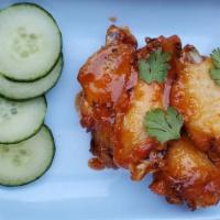Gai Tod · Gluten free. Thai chicken wings with sweet chili sauce.