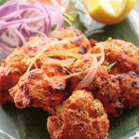 Chicken Tikka Kebab (Boneless) · Chicken breast boneless, marinated with spices and yogurt, grilled in our clay oven. All our...
