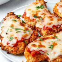 Chicken Parmesan · Chicken breaded and fried to a crispy golden brown topped with marinara sauce and served on ...