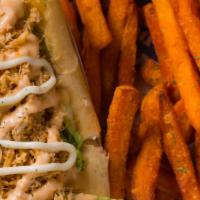 Crab Meat Po'Boy · Louisiana style sandwiches served with toasted hero bread, lettuce, tomatoes, garlic spread,...