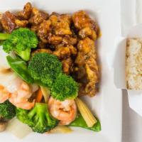 Dragon & Phoenix · Jumbo shrimp with Chinese vegetable in white sauce & general tso's chicken.