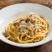 Spaghetti Carbonara · homemade spaghetti, eggs, Pecorino Romano, Parmigiano-Reggiano, crispy bacon