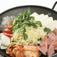 Boo Dae Jungol · Spicy assorted sausages, kimchi, noodles & vegetables casserole.